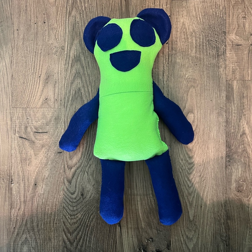 Green and blue panda bear